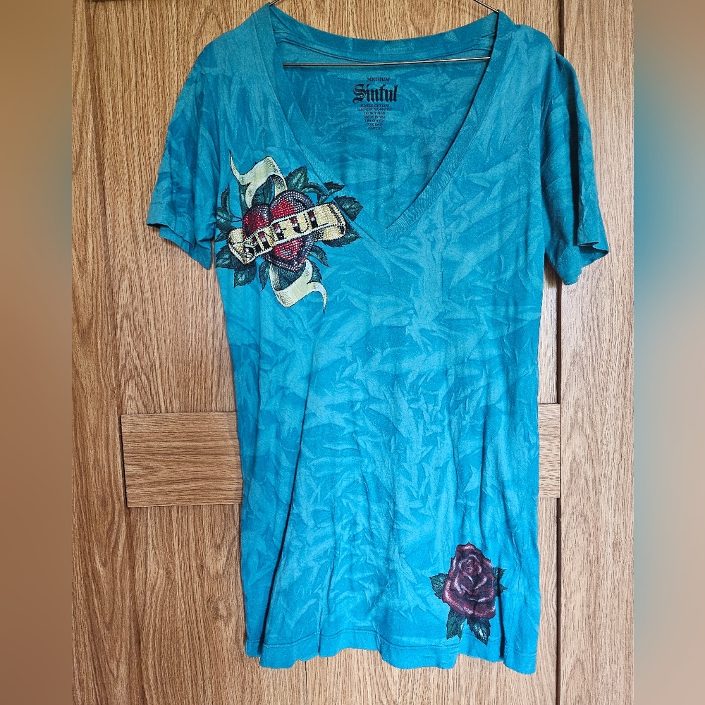 Sinful blue green blinged heart and dagger tee